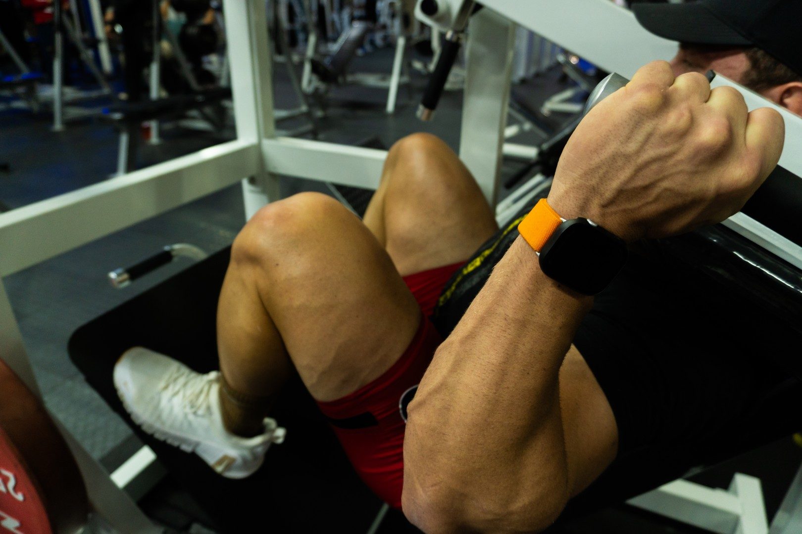 Close up of athlete on hack squat machine